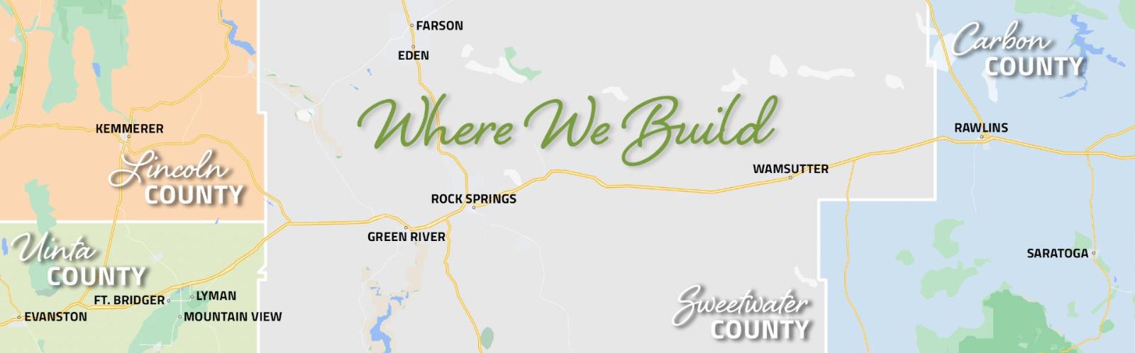 A map from Smart Dwellings' website showing the areas where they build in southwestern Wyoming. The map highlights Uinta, Lincoln, Sweetwater, and Carbon counties. Key towns include Evanston, Kemmerer, Ft. Bridger, Lyman, Mountain View, Rock Springs, Green River, Wamsutter, Rawlins, and Saratoga. The text "Where We Build" is prominently displayed in the center.